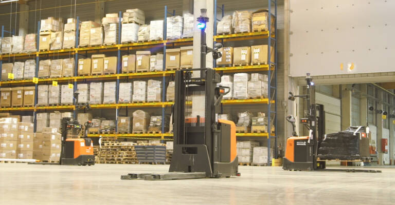 Automated trucks in DSV warehouse