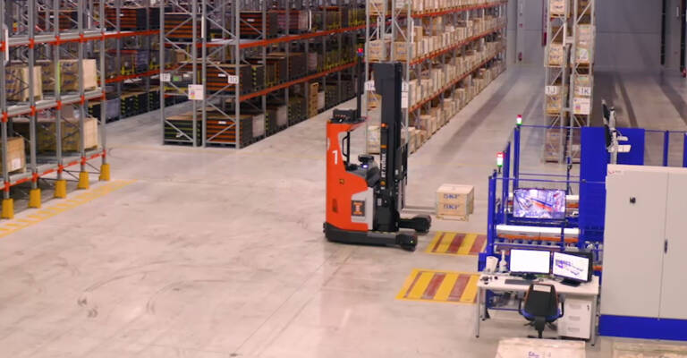 Two AGVs operating in a warehouse